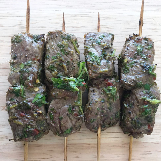 Beef skewers in chimichuri sauce with roasted capsicum mayonnaise