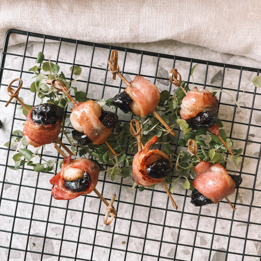 Water chestnuts & prunes wrapped in bacon