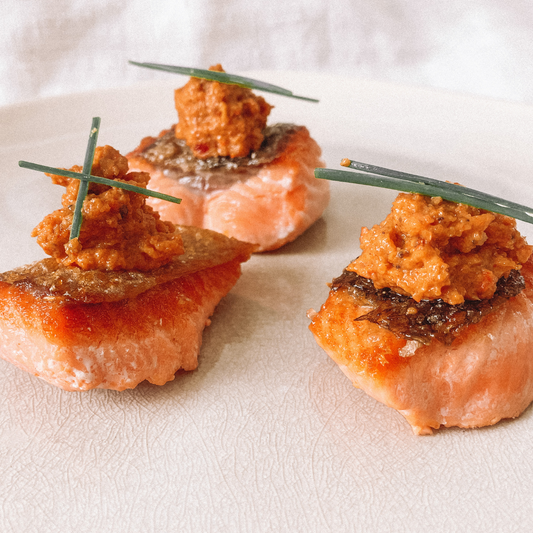 Cube of seared salmon with muhammara